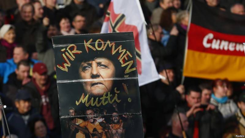 جرمنی میں چانسلر مرکل کے خلاف احتجاجی مظاہرہ