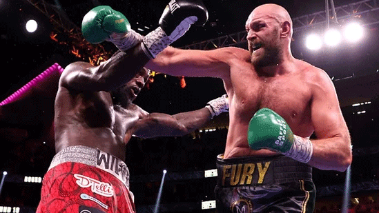 Tyson Fury defeats Deontay Wilder to retain WBC heavyweight title in Las Vegas